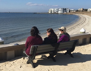 Relaxing on Bench at beach – cropped